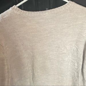 Sweater size small but can fit medium as well